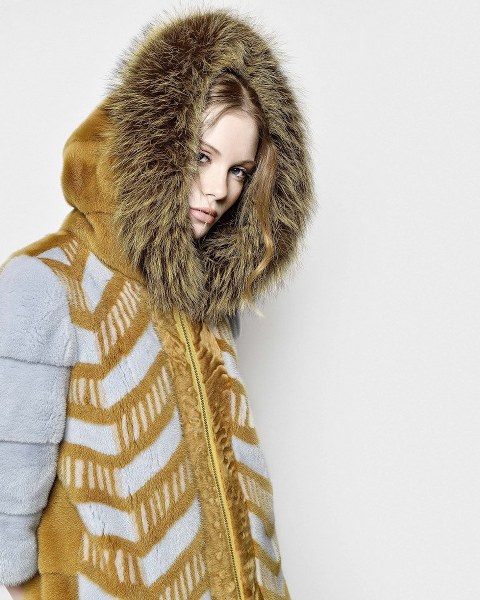 gold mink coat with grey details and fox hoodie